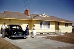 Chevy two-door sedan, Car, brand new Home, House, single family dwelling unit, suburbs, suburbia, August 1959, 1950s