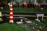 Lighthouse, cars, ferry landing, boat, Miniature park, Madurodam, Scheveningen district of The Hague, Netherlands, April 1968, 1960s, CZEV01P01_11