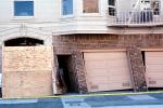 Bent Garage Doors, Marina district, Loma Prieta Earthquake, (1989), 1980s, DAEV01P10_02