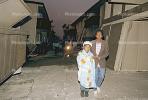 Survivors, Child, Woman, Apartment Building Collapse, Northridge Earthquake Jan 1994, DAEV03P08_12