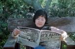 Asian Woman reads a Tabloid, It's Alive, ENCV01P05_02