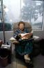 Woman reading the morning newspaper, ENCV01P05_12