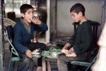 Boys eating, Isfahan, FDAV01P05_17