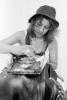 Woman Eating, fingers, hat, 1970s