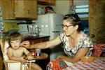 Mother Feeding Daughter, Hair Curlers, Haircurlers, hair roller, hairrollers, lockenwickler, highchair, 1950s