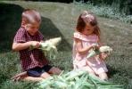 Shucking corn, Brother, Sister, Siblings, Backyard, 1950s, FDNV02P13_16