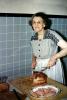 Grandma, grandmother, woman, slicing meat, roast, cooked, plate, cutting, 1940s