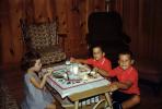 Eating in the Living Room, boy, girls, 1950s, FDNV03P04_14