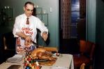 Carving a Thanksgiving Turkey, Slicing, cutting, man,, 1950s, FDNV03P04_16