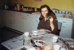 Woman Smiles with her Cat, Breakfast Table Setting, Coffee, Kitchen, 1950s, FDNV03P04_19