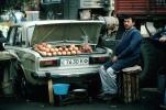 Man, Male, Onions, Fiat, Trunk, Samarkand, Uzbekistan, FGAV02P06_18
