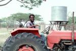 Man with Tractor, Water Tank, Madzongwe, Zimbabwe