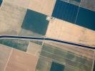over the Central Valley, near Fresno, Aqueduct, Central California, Canal, patchwork, checkerboard patterns, farmfields, FMND01_239