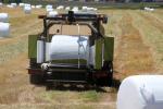 Tractor, baling hay, rolls, dust, dusty, Uniwrap, Rollant, CLAAG, FMND03_226