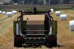 Tractor, baling hay, rolls, dust, dusty, Uniwrap, Rollant, CLAAG, FMND03_238