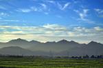 Mountains and Clouds over Farmland, FMND04_151
