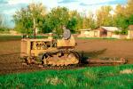 Farmer, Tractor pulling a Rotary Disk Till, Cultivator, Plowing, Tilling, Tractor, Rototill, Rotary-Till, Dirt, soil
