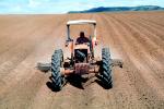 Tractor Pulling Rotary Disk Plow, Coastal Santa Cruz County, California, Dirt, soil, FMNV01P10_17