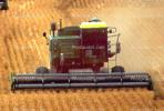 Harvesting Wheat with Mechanized Combines, John Deere Turbo 6622 Combine, farmfield, wheat field, golden amber waves of grain, swather, windrower, FMNV04P05_18C