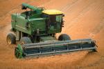 Harvesting Wheat with Mechanized Combines, John Deere Turbo 6622 Combine, farmfield, wheat field, golden amber waves of grain, swather, windrower, FMNV04P06_17.0839