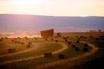 Hay Bales, Buncher, dust, late afternoon, hills, stacker, stack