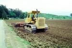 Harrow Disc Plow, Tilling the Soil, Tiller, Caterpillar Tractor, near Castroville, California, FMNV06P08_19