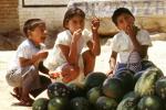 Boys, Girl, eating, Water Melons, Oaxaca, Mexico, funny, FPRV01P05_10C