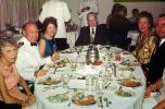 Formal Dinner, Ships Captain, Captains Table, Cooked food, meat, steak, men, women, formal attire, 1950s, FRBV01P01_09