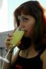 woman drinks a Mimosa