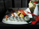 sushi, chopsticks, ginger, saki bottle, plate, platter, ebi, ikura, octopus, FTDV01P06_09