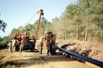 Crane, Tractor, Laying down Water Pipe, Pipline, Ditch, Africa