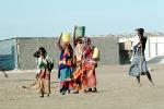 Women and Girls Carrying Water, Refugee Camp, Somalia