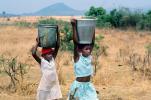 Girls Carrying water back to the village, Child-Labor