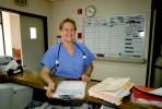 Smiling Nurse, Clock, Schedule Board