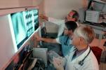 Doctors Looking at X-Ray, light box, Woman, Men, HHPV01P13_03