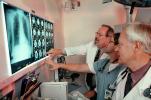 Doctors Looking at X-Ray, light box, Woman, Men, HHPV01P13_05