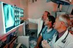 Doctors Looking at X-Ray, light box, Woman, Men, HHPV01P13_07