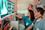 Doctors Looking at X-Ray, light box, Woman, Men, HHPV01P13_13