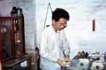 Apothecaries Canvas, Apothecary, Man, Male, Chinese Medicine, lab, drugs, Mortar and pestle, China, June 1973, 1970s, HPDV01P08_09
