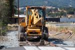 Front Loader, wheeled tractor, Laying down new Rails, 2014, Construction for the new SMART train, ICRD01_028
