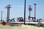 Pump Jack, Pipeline, Oil Storage Holding Tanks, northwest of Taft, California, IPOV03P14_09