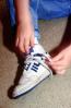 Boy Tying his shoes, shoestring, ITFV01P03_09
