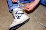 Boy Tying his shoes, shoestring, ITFV01P03_10