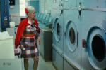 Woman at the laundromat, machines, mod dress, female, 1960s, ITWV01P02_05B