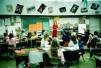 training, instruction, teachers, teaching, classroom, class room, raised hands, chalkboard