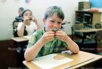 classroom, student, Boy, Male, Guy, cupcake, smiles, eating, Children Eating Lunch, desk, KEDV02P06_19