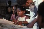 Girl learning to read, Reading, Teacher, classroom, Student, Madzongwe