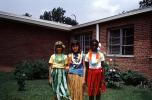 Hawaii Day, Girls, Grass Skirts, Lawn, Brick Building, 1950s