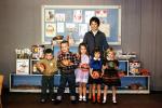 Teacher and Students in classroom, boys, girls, ball, toys, 1960s, KEDV04P04_11