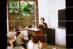 Teacher teaching math  in Classroom, China, 1973, 1970s